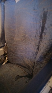 The seat next to me as it had water drip on it. 