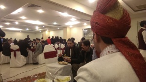 Awais looking at the mass of friends and family in front of him.